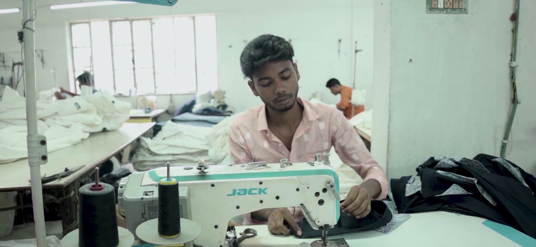 A jean panel being run through