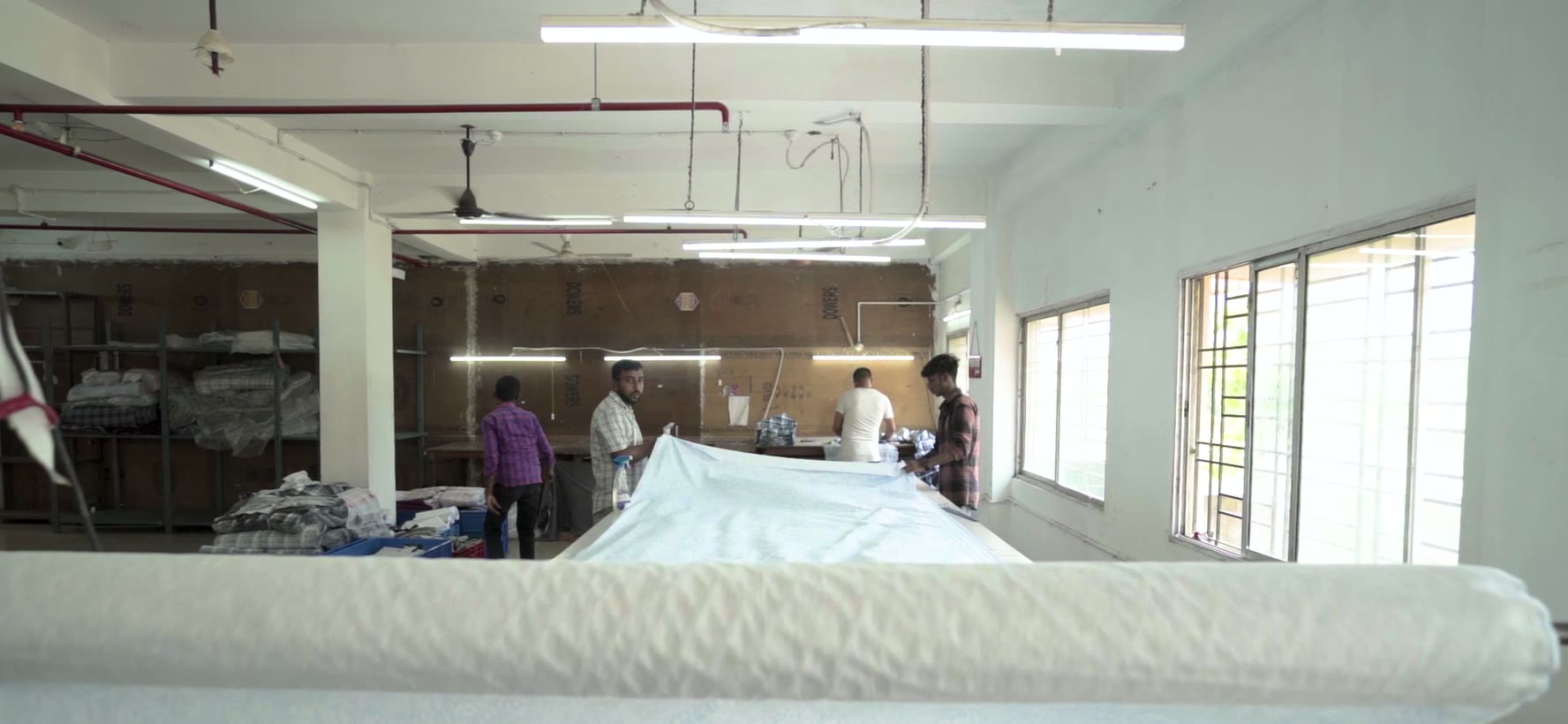 Shirting laid up in layers on the cutting table